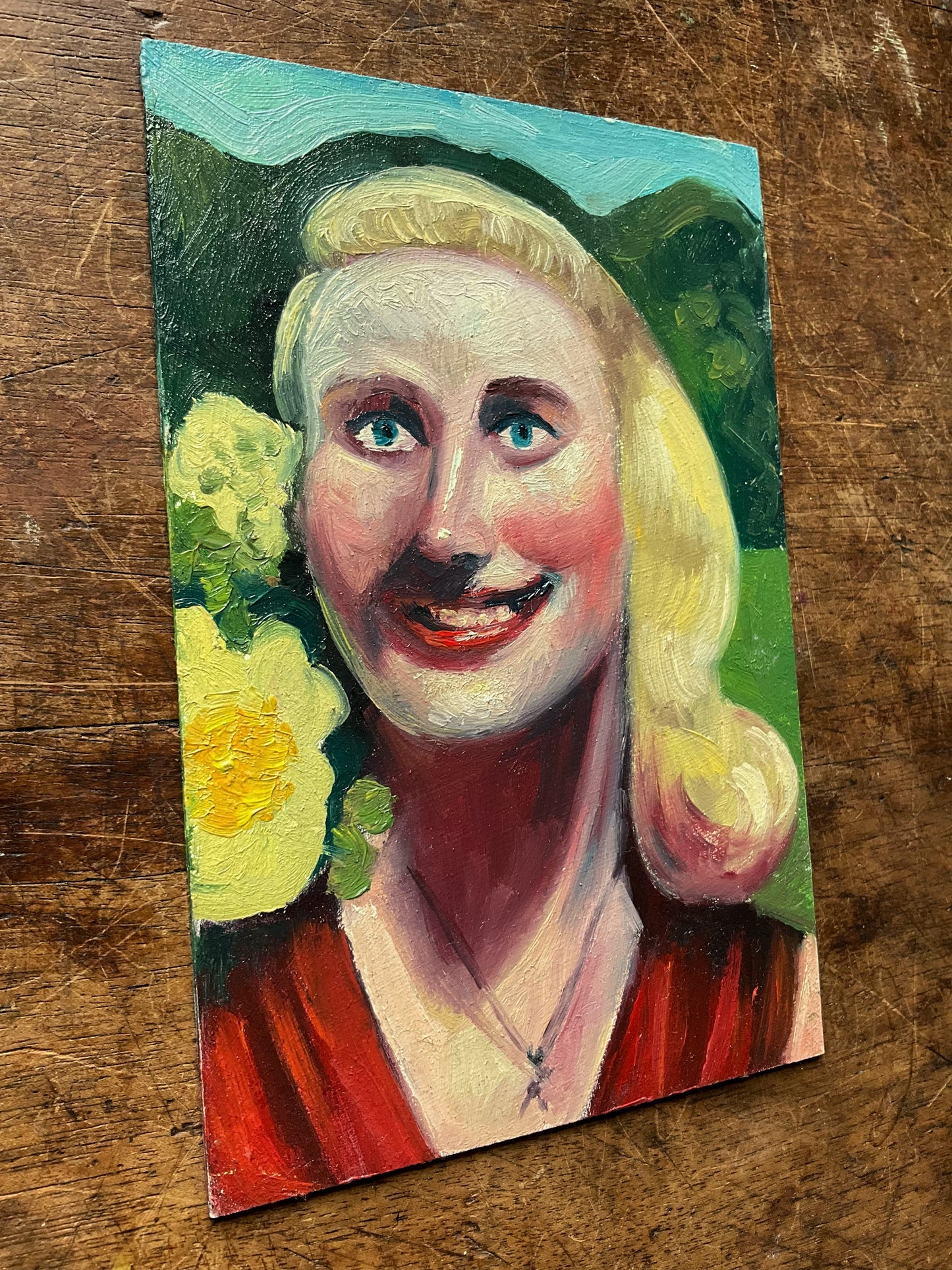Woman Smiling Wearing a Red Dress